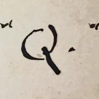 Handwritten letter Q